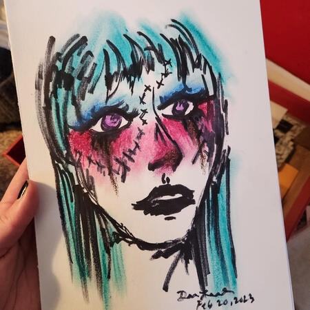 a scribbly sharpie and crayon portrait.